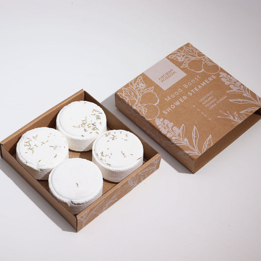 The Bliss Co Zen Shower Steamers Therapy Wellness Gift Set, mood-boosting shower steamers arranged in a gift package.